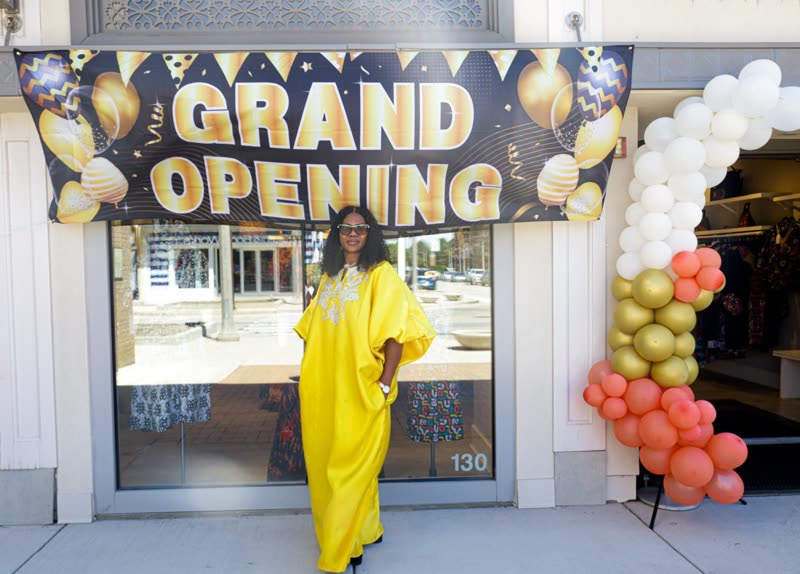 Roseline Olugbamila outside the RoseGold Couture store at The Promenade Bolingbrook